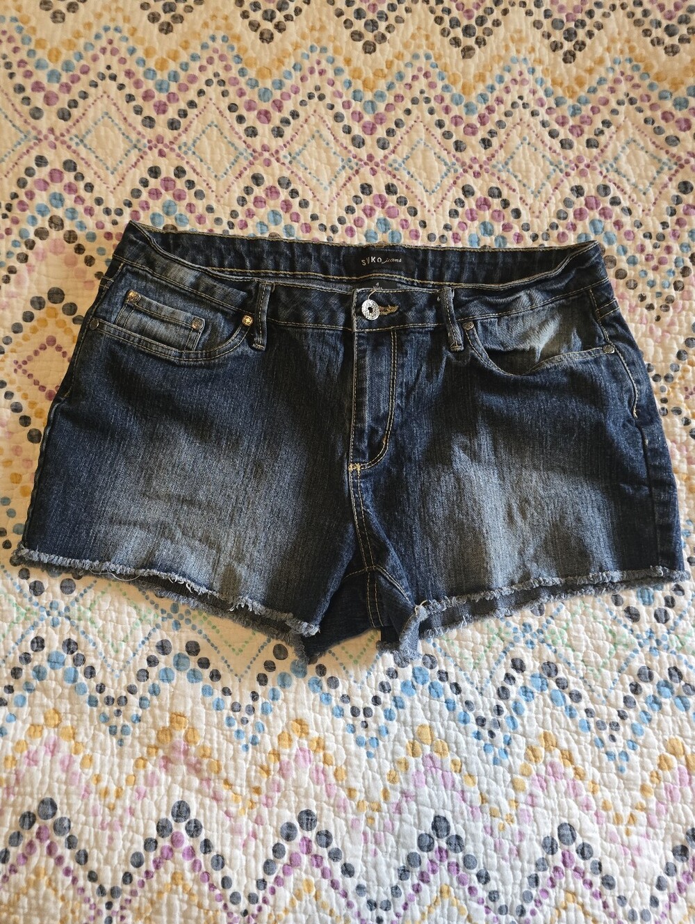Suko Jeans women's denim cutoff shorts,dark wash and a Fraded Hem
